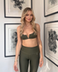 Rozal Active founder wearing Moss green PowerFlex leggings and deep V Wire Bra, showcasing the brand's commitment to performance and style